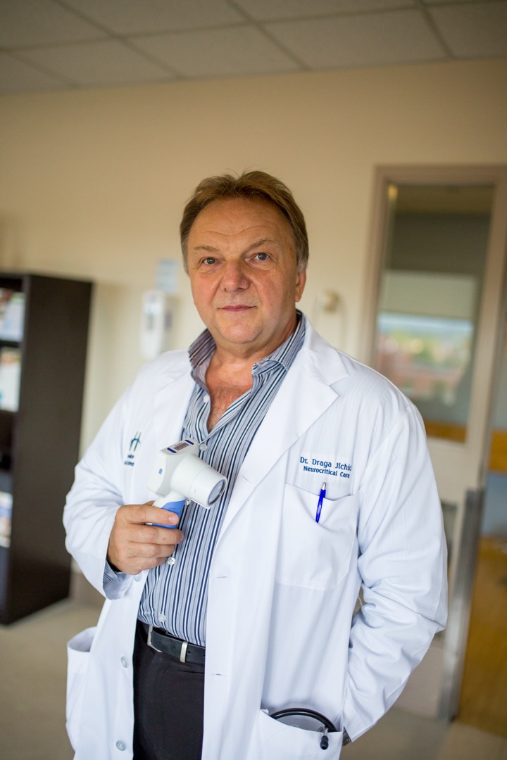 Dr. Draga Jichici shows off Hamilton General Hospital's new pupillometre