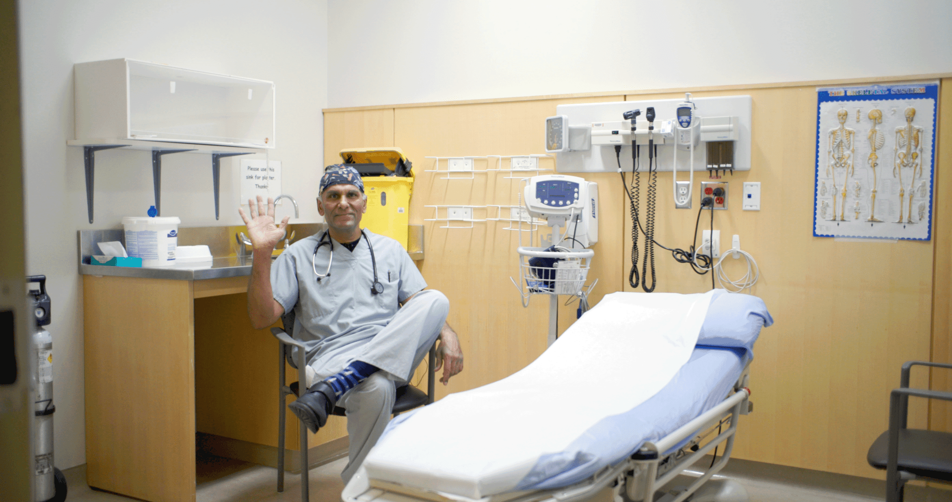 Dr. Kuldeep Sidhu in an exam room at the west end urgent care centre